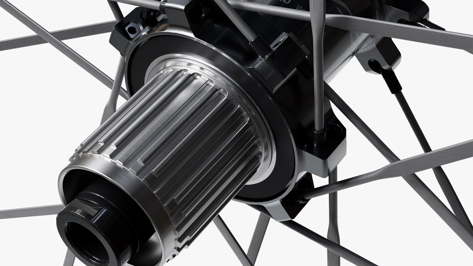 Gros plan du moyeu arrière de la roue Shimano Dura-Ace WH-R9370 : le corps de roue libre cannelé en aluminium, de type HG L2, sur lequel vient se monter la cassette